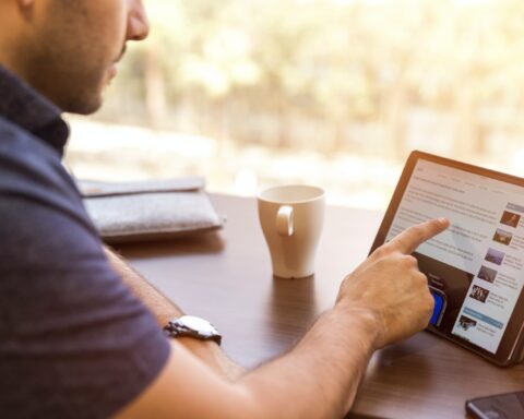 man holding tablet computer